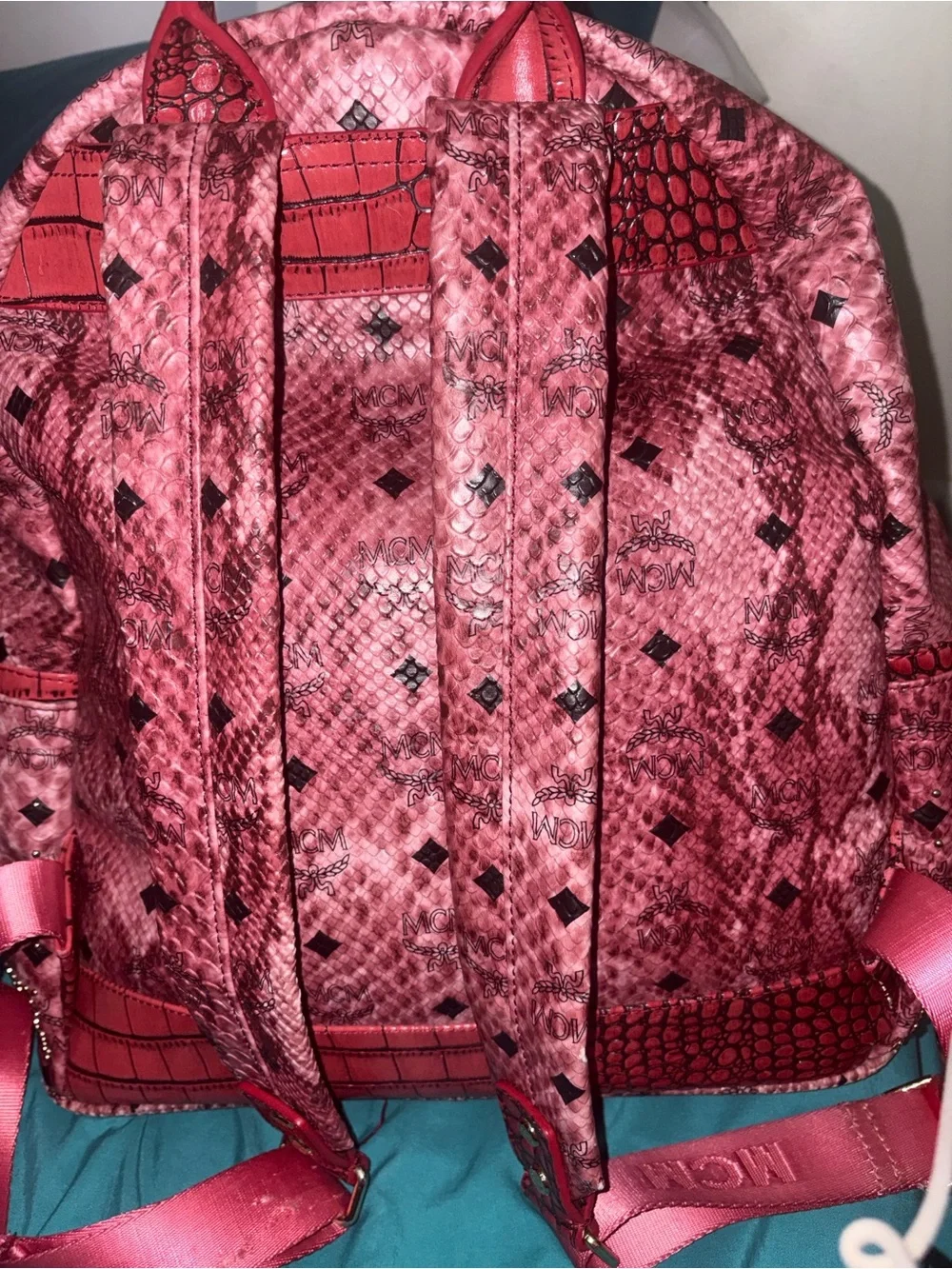 MCM Pink Studded Python-Effect Backpack with Gold Hardware